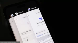 Smartphone screen displaying AI tools DeepSeek, ChatGPT, and Gemini on a web browser, representing artificial intelligence technology in real estate.