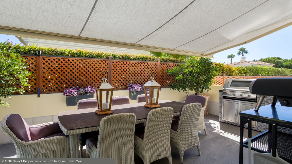 Outdoor dining space at an Algarve home in summer